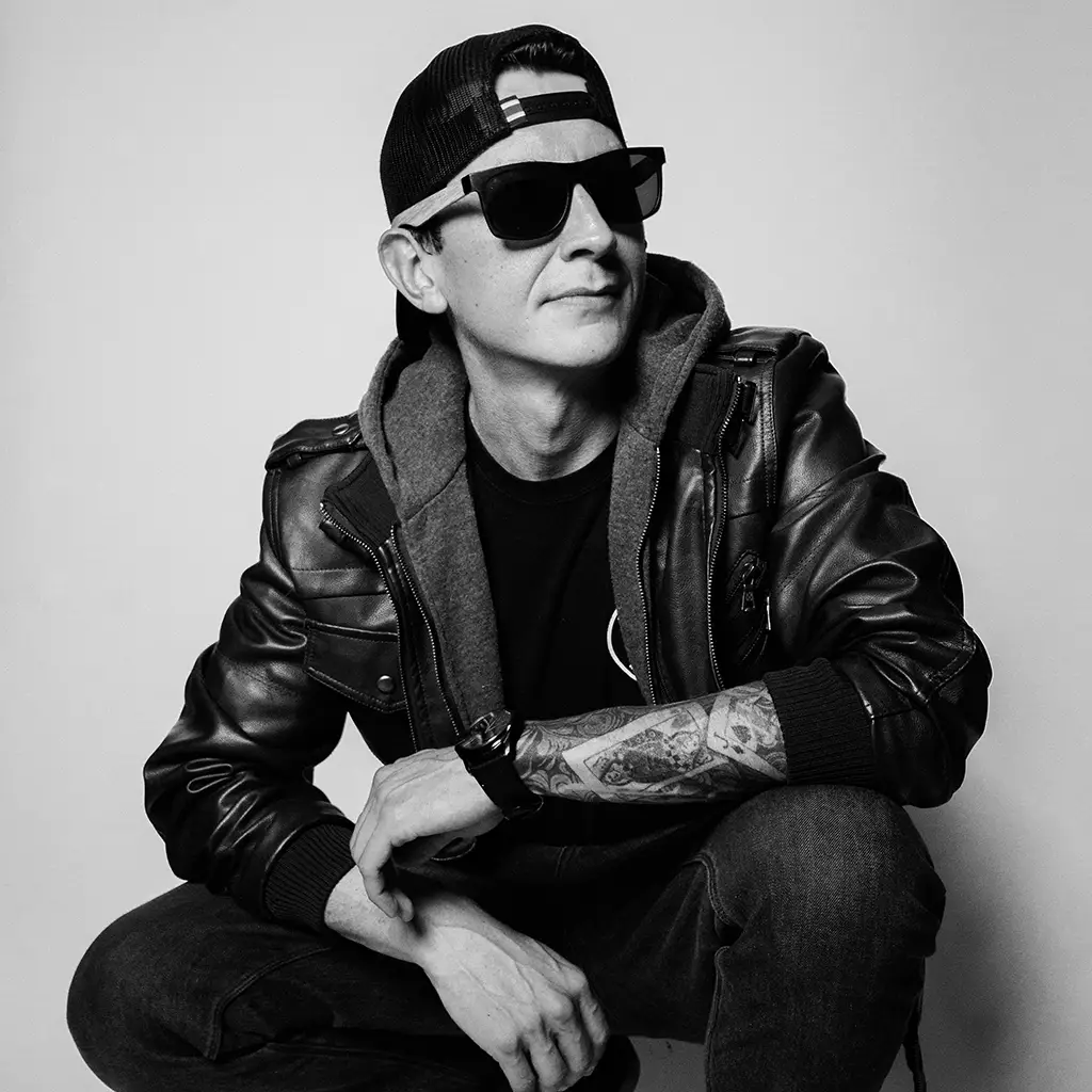 Louisticks - Hybrid live DJ and percussionist known for fusing techno, psytrance and live drumming into immersive experiences